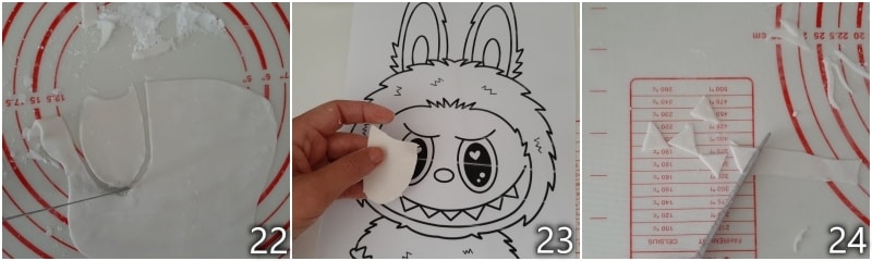 h. cortar as decorações brancas de pasta de açúcar olhos e dentes