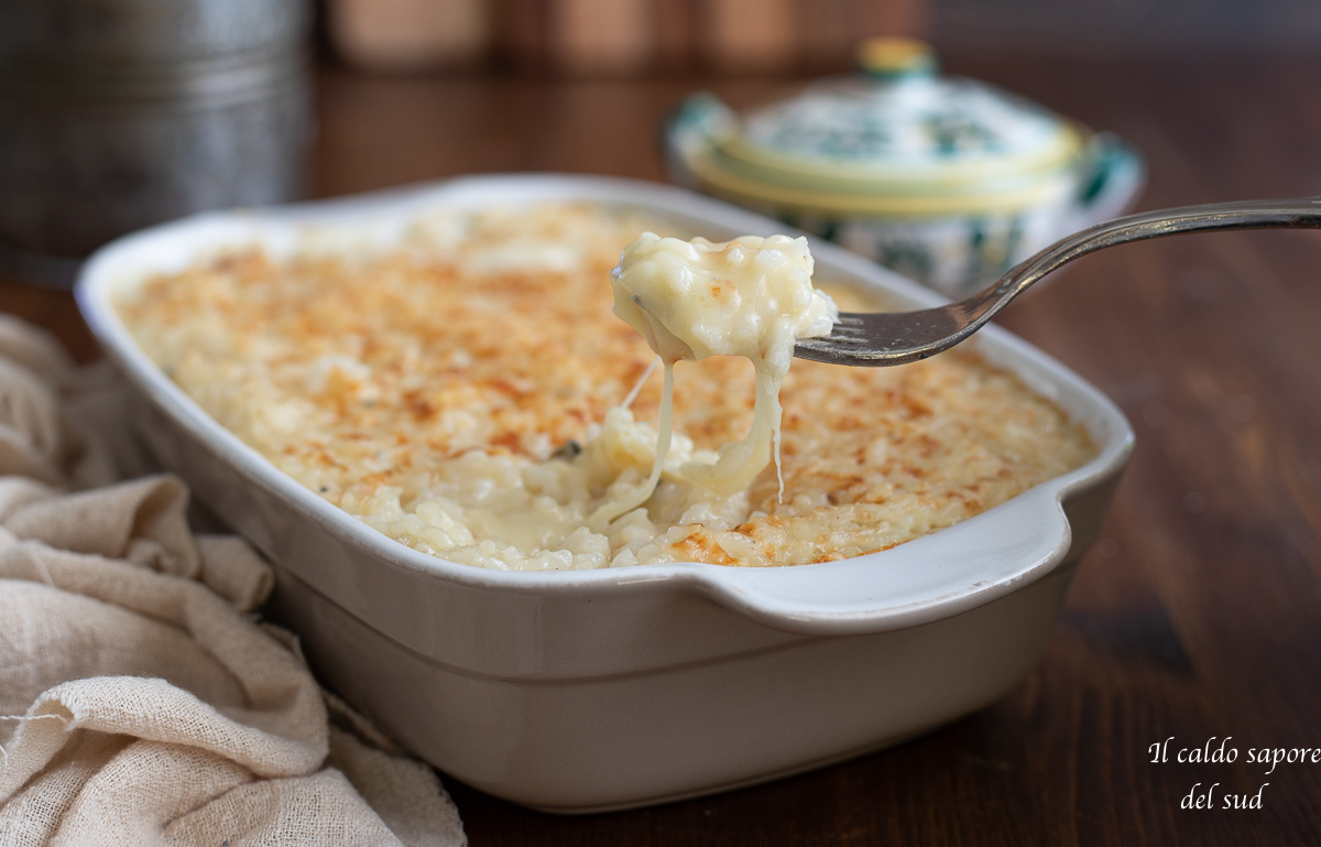 Risoto gratinado no forno aos quatro queijos