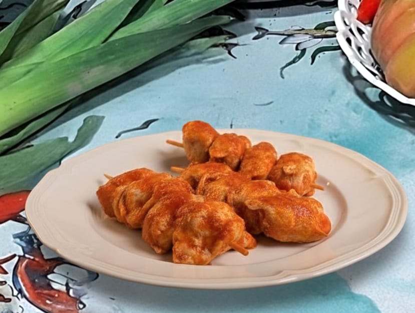 Rolinhos de lombo ao molho de tomate