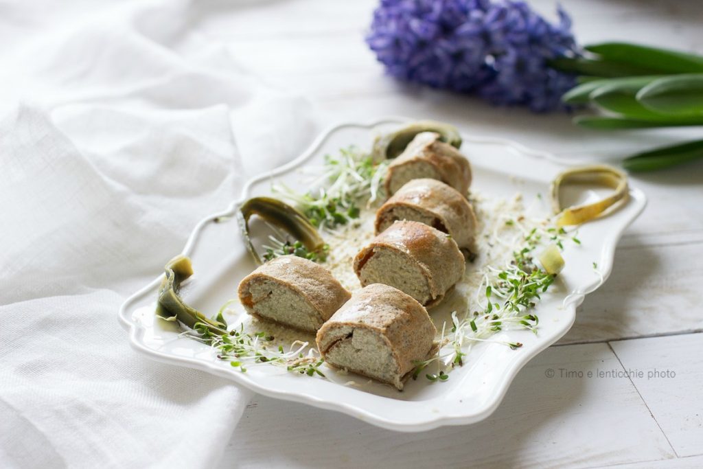 Roll de crepes de painço recheadas com alcachofras, nozes e tofu