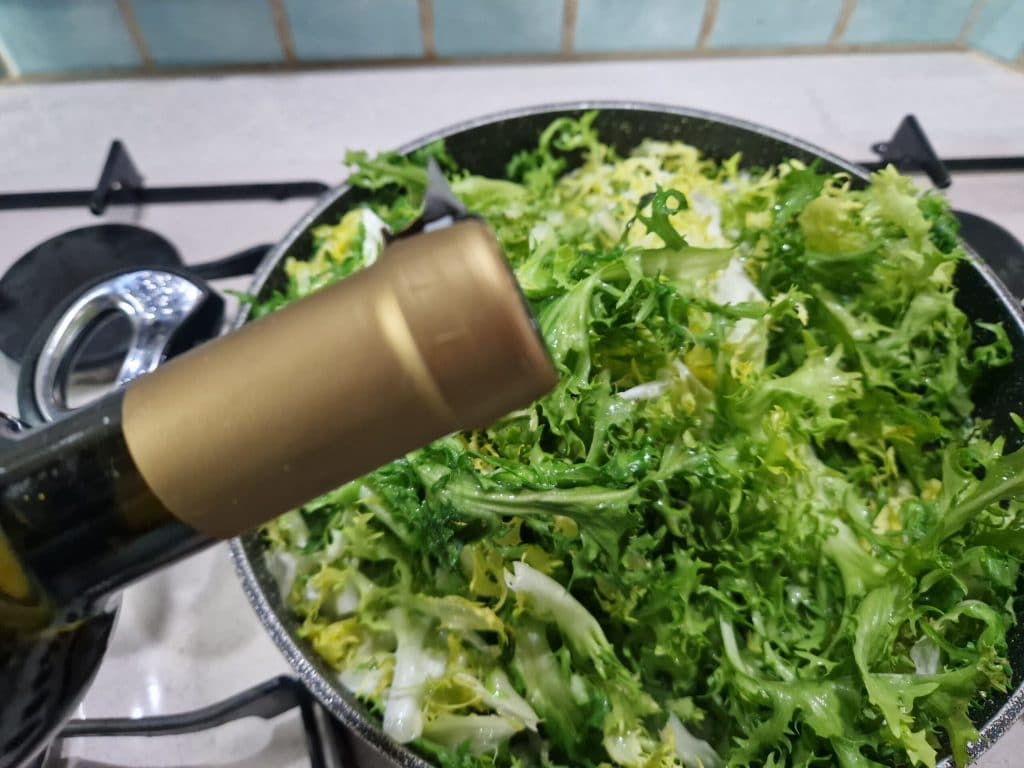 De gestoofde andijvie