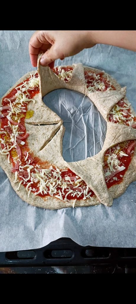 Breng elke punt naar de rand van de pizza