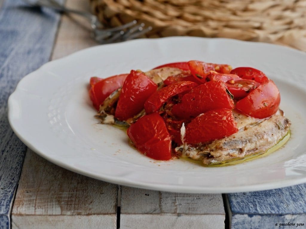 Ansjovis uit de oven met tomaatjes en oregano