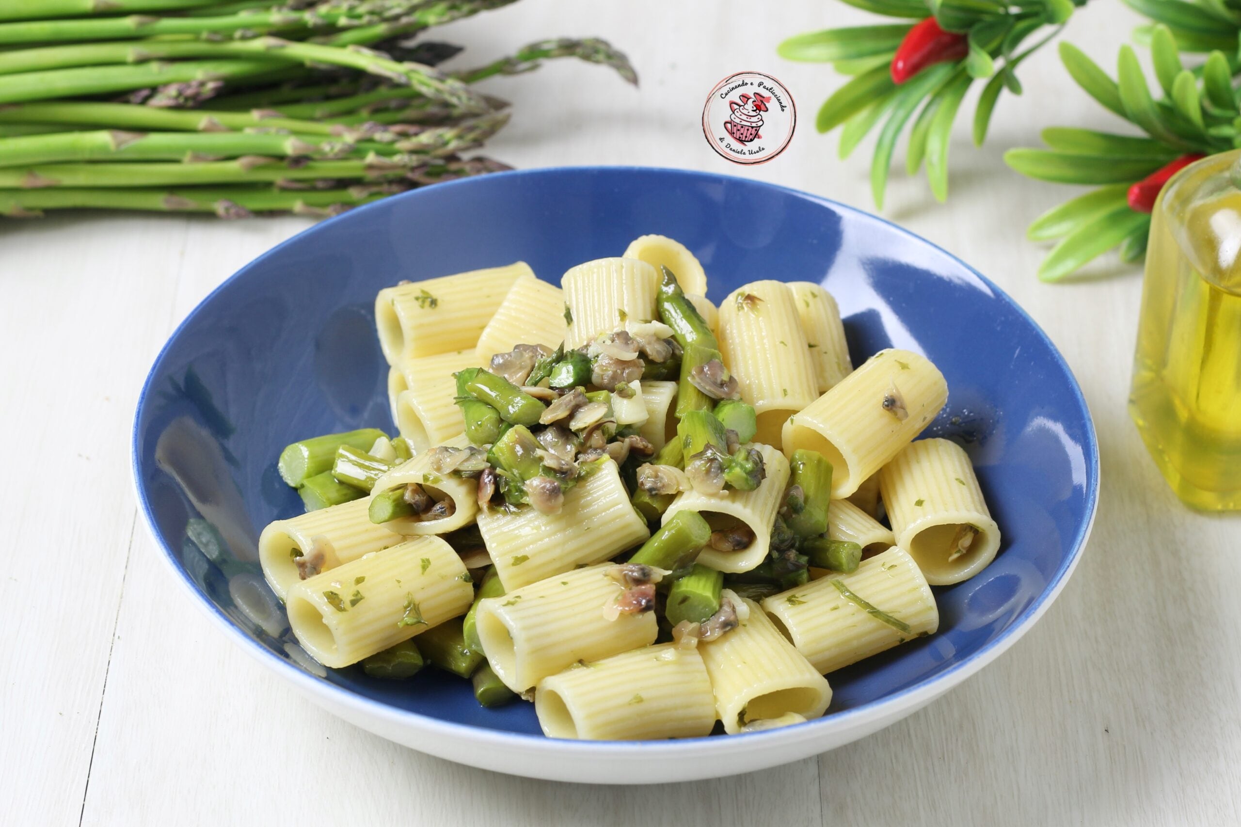 Snelle pasta met asperges en venusschelpen