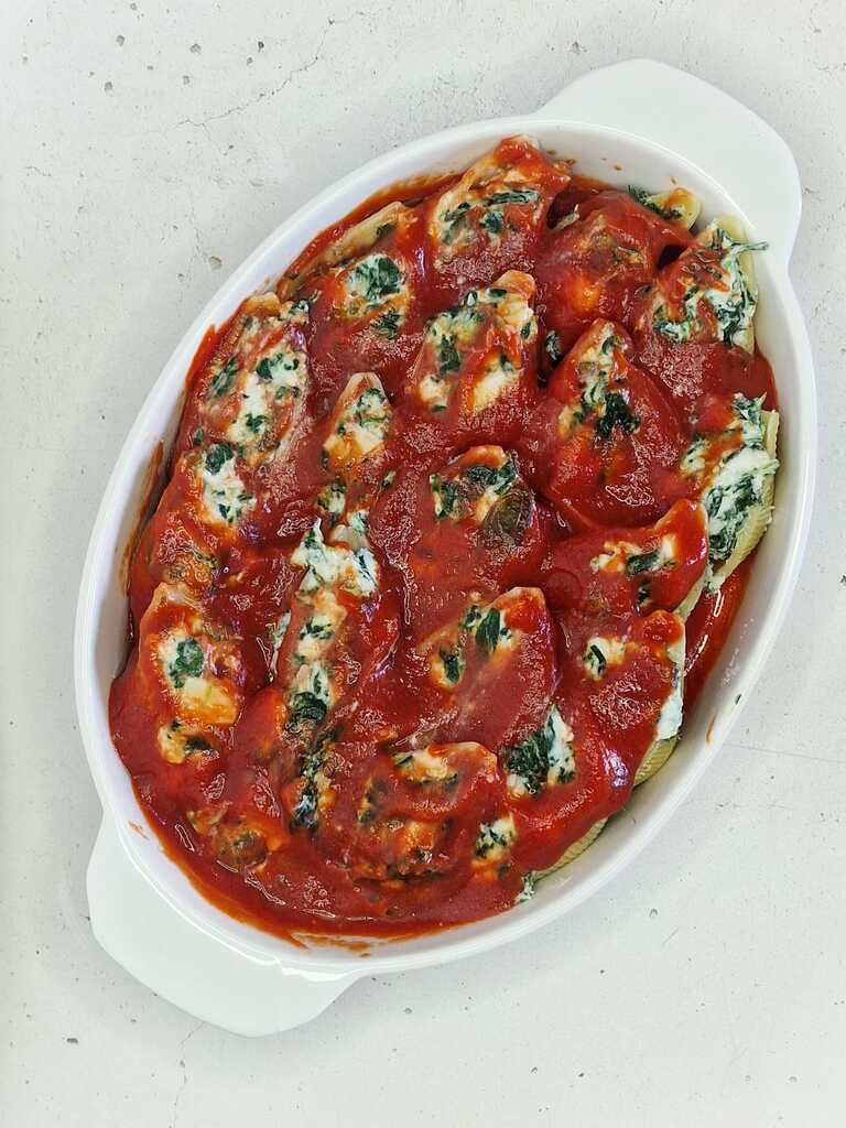 Gevulde conchiglioni met ricotta en spinazie uit de oven