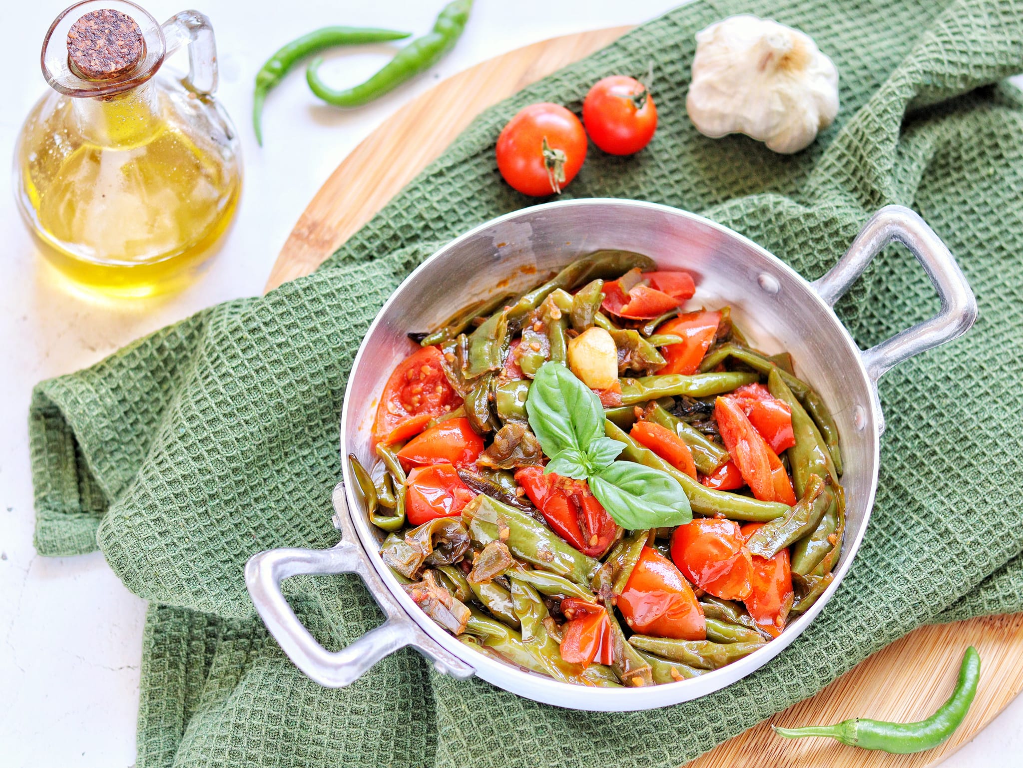 Groene pepers in de pan