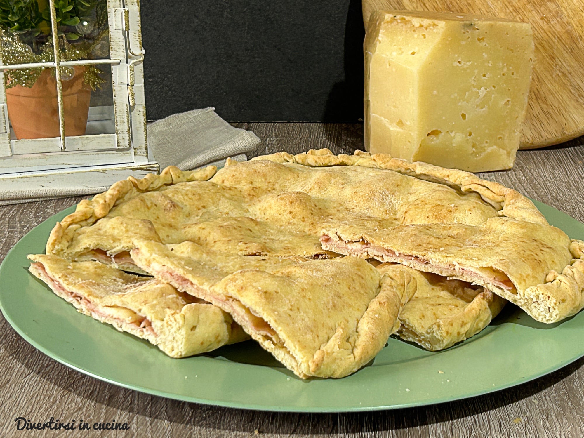 Hartige taart met stracchino en mortadella