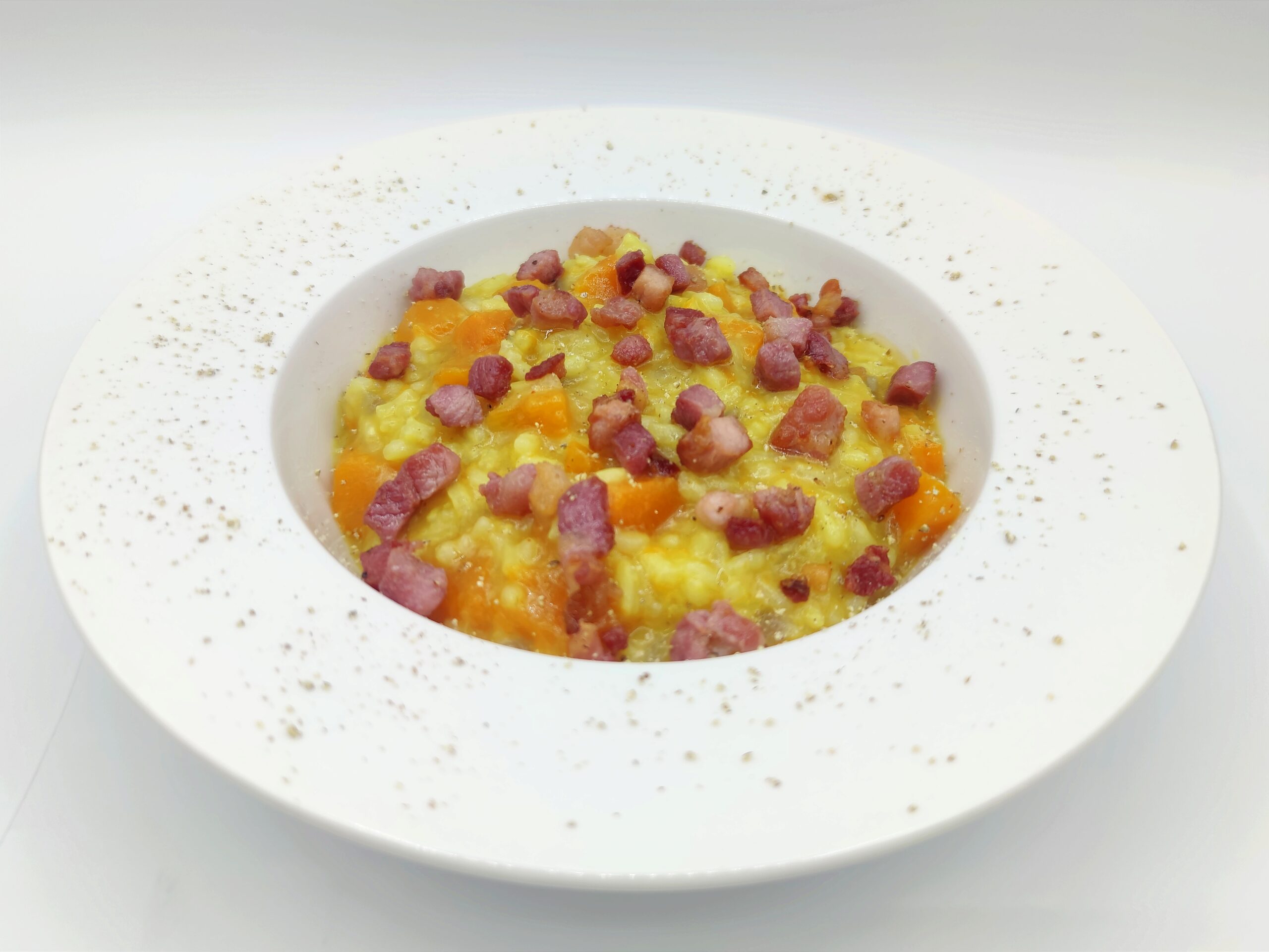 Risotto met pompoen en gerookt spek