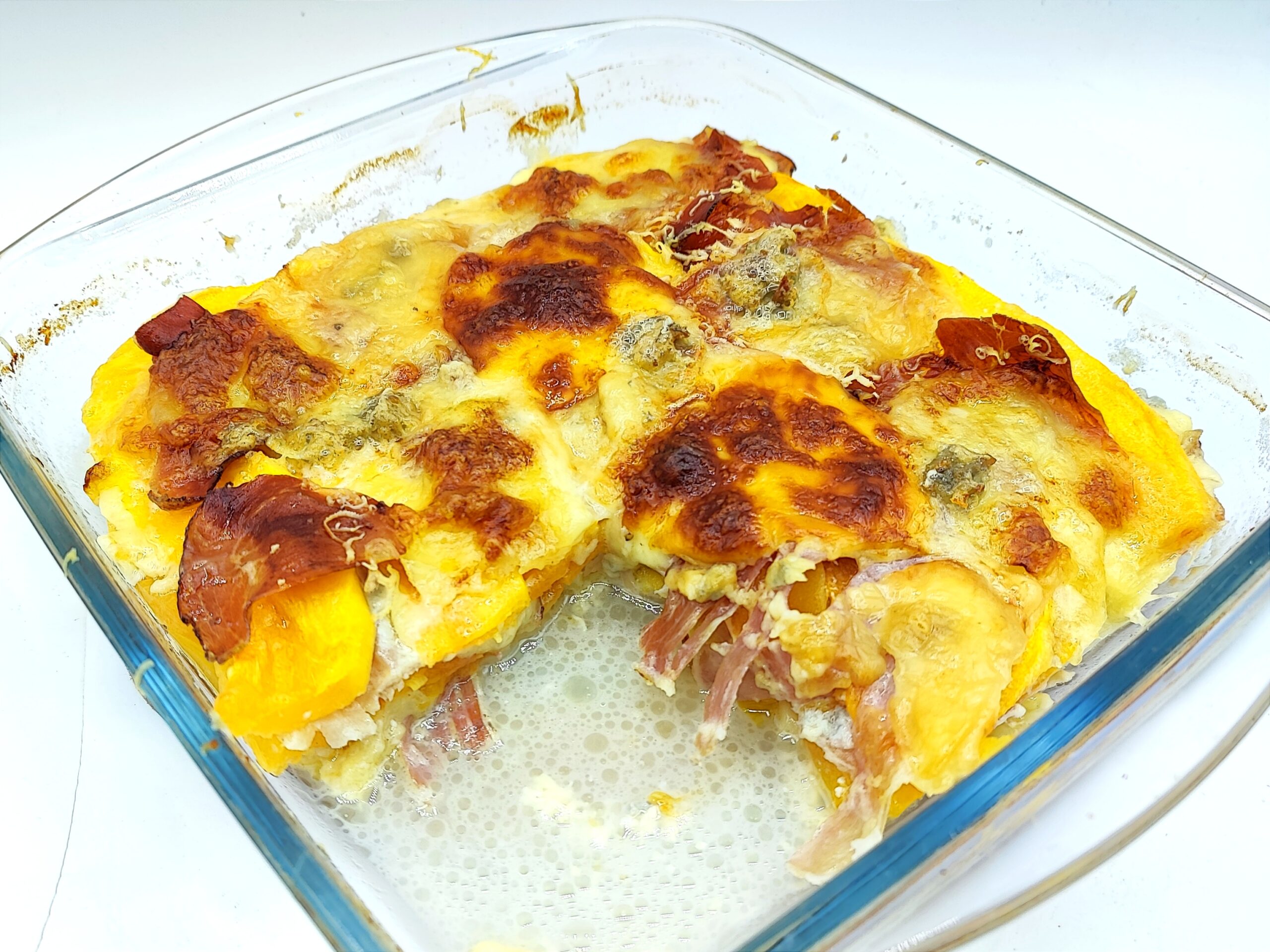 Pompoen Parmigiana met speck en gorgonzola