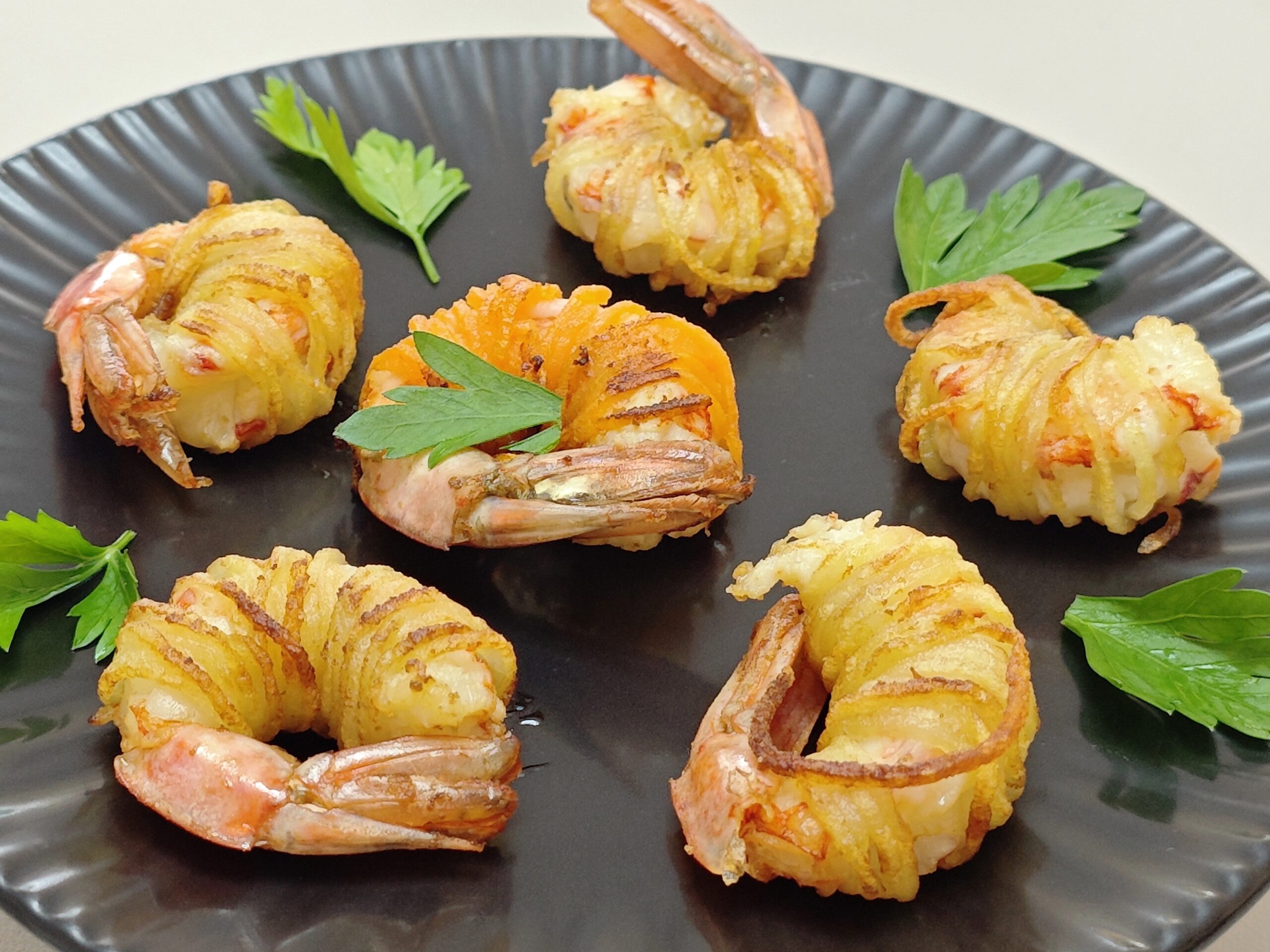 Garnalen in aardappelfrietjes