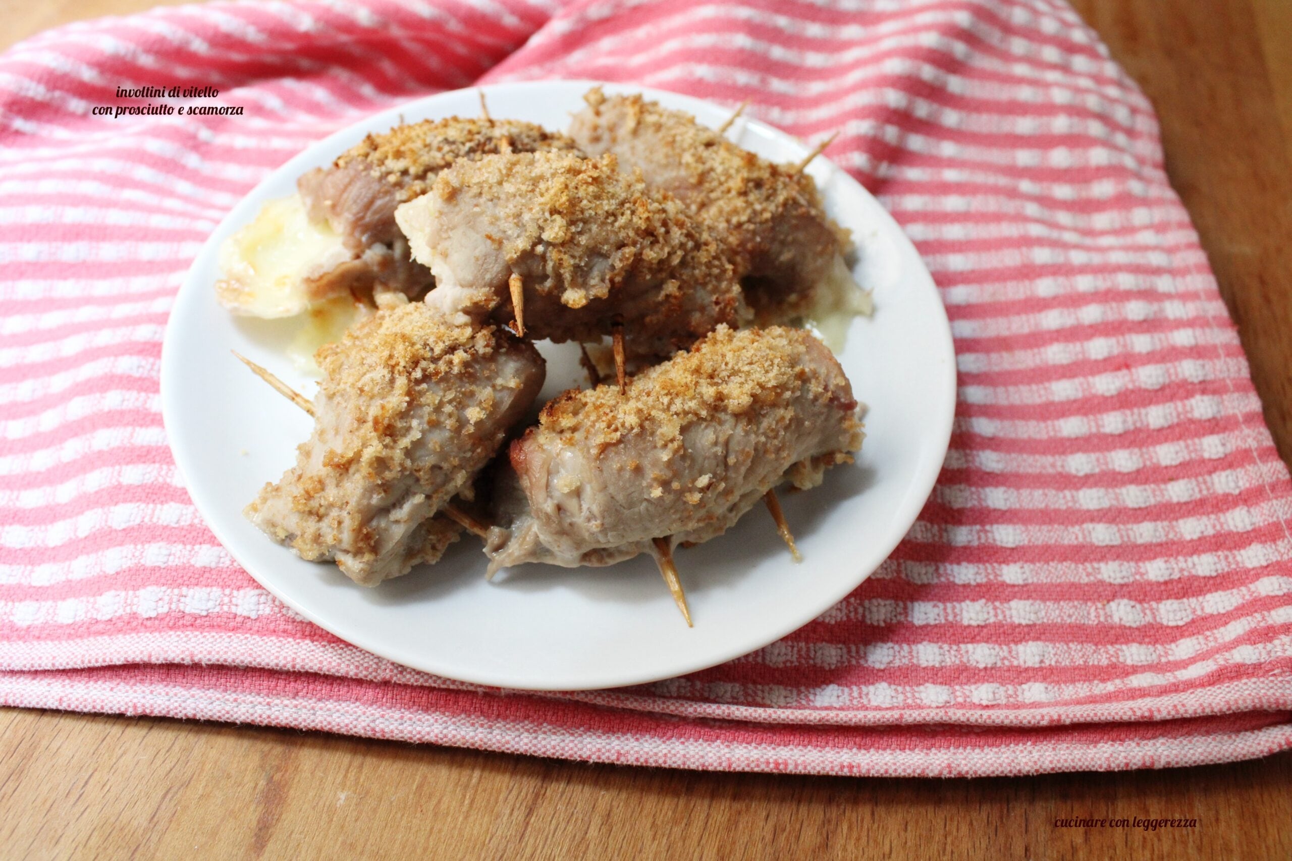 Kalfsvleesrolletjes met ham en scamorza