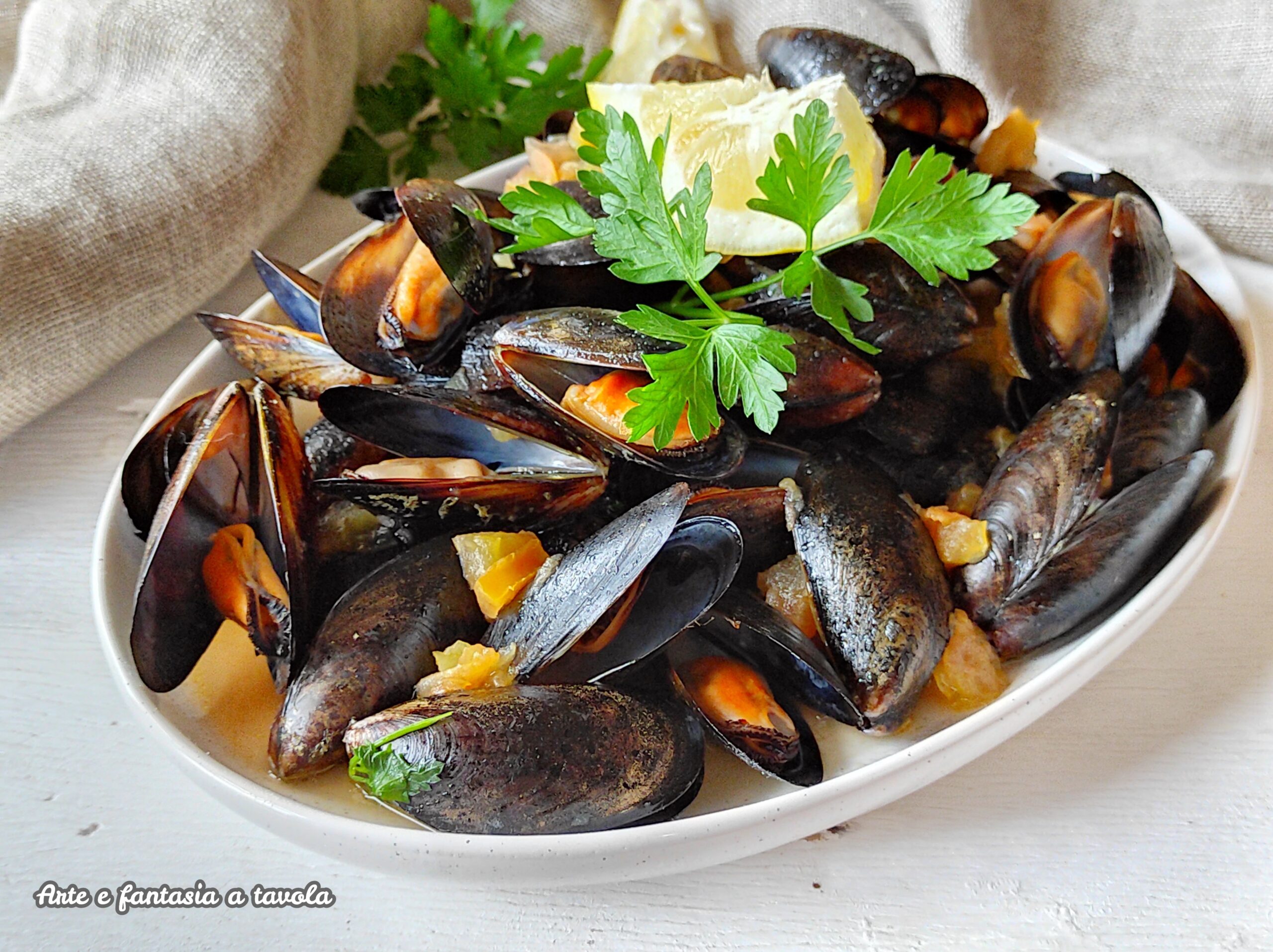 Mosselen alla marinara en tomaat