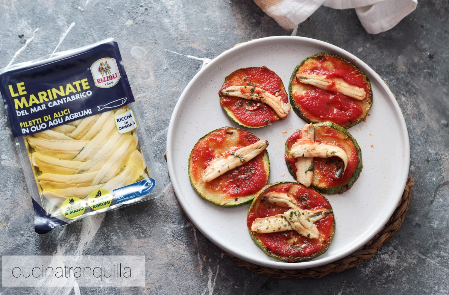 Ronde courgette-pizza’s met ansjovis