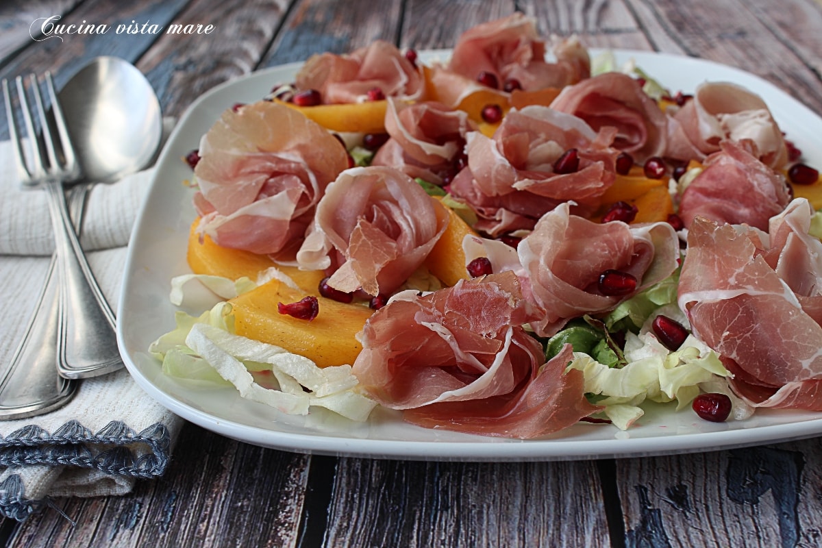 Salade van kaki en ham