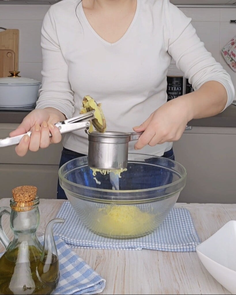 druk de aardappelen