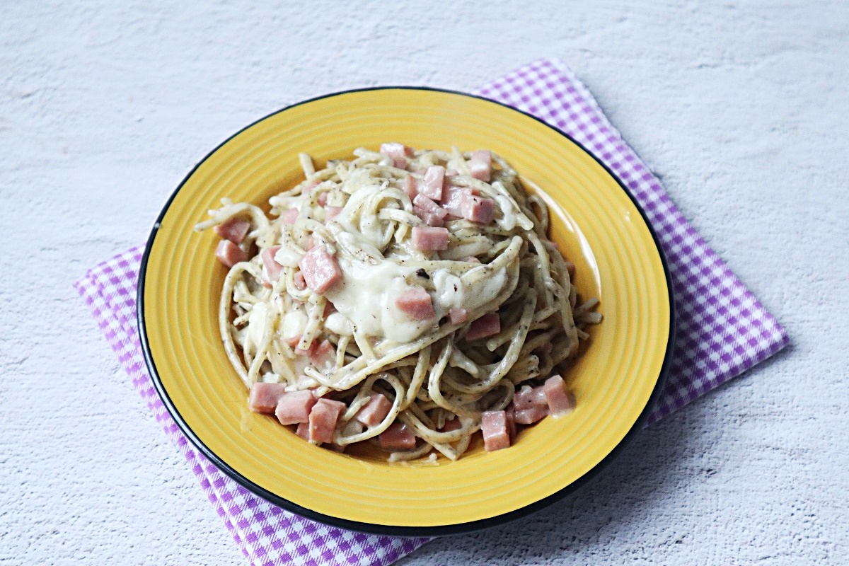 Tagliolini met truffel met mortadella en provolone