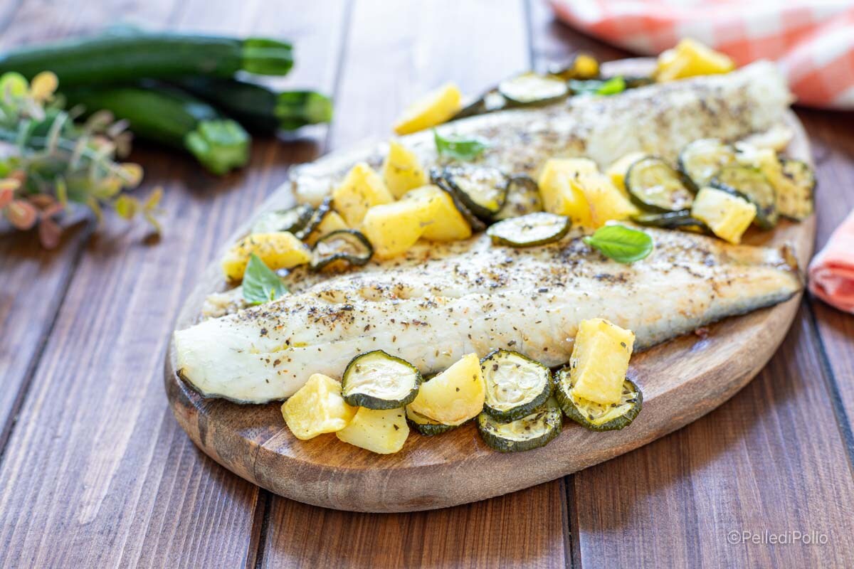 Zeebaarsfilets met aardappelen en courgettes uit de oven