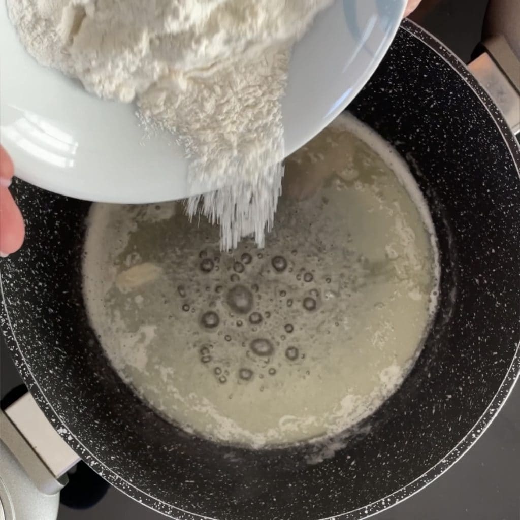 lasagnerolletjes met ham en champignons