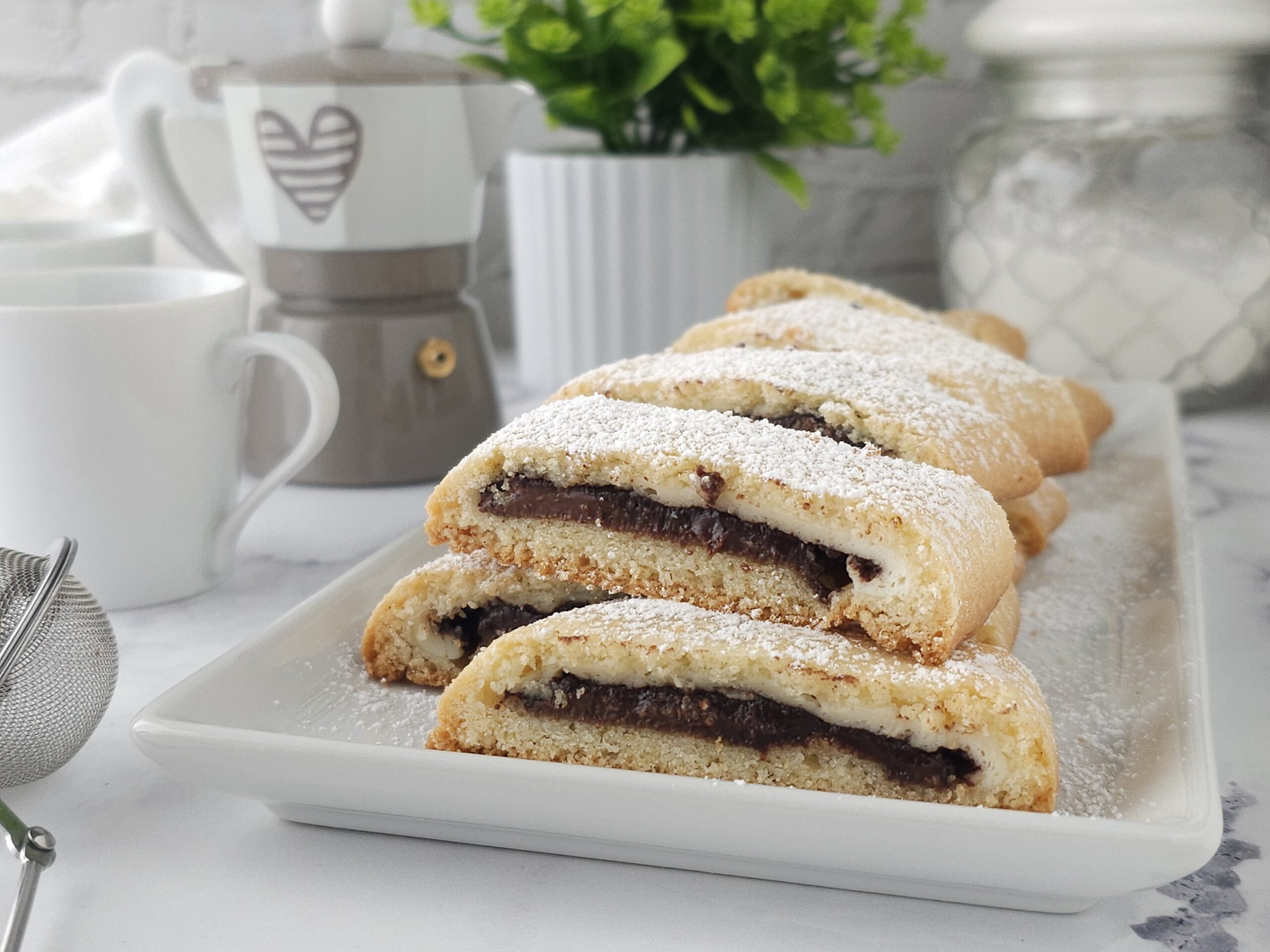 Rol van zanddeeg met Nutella en ricotta