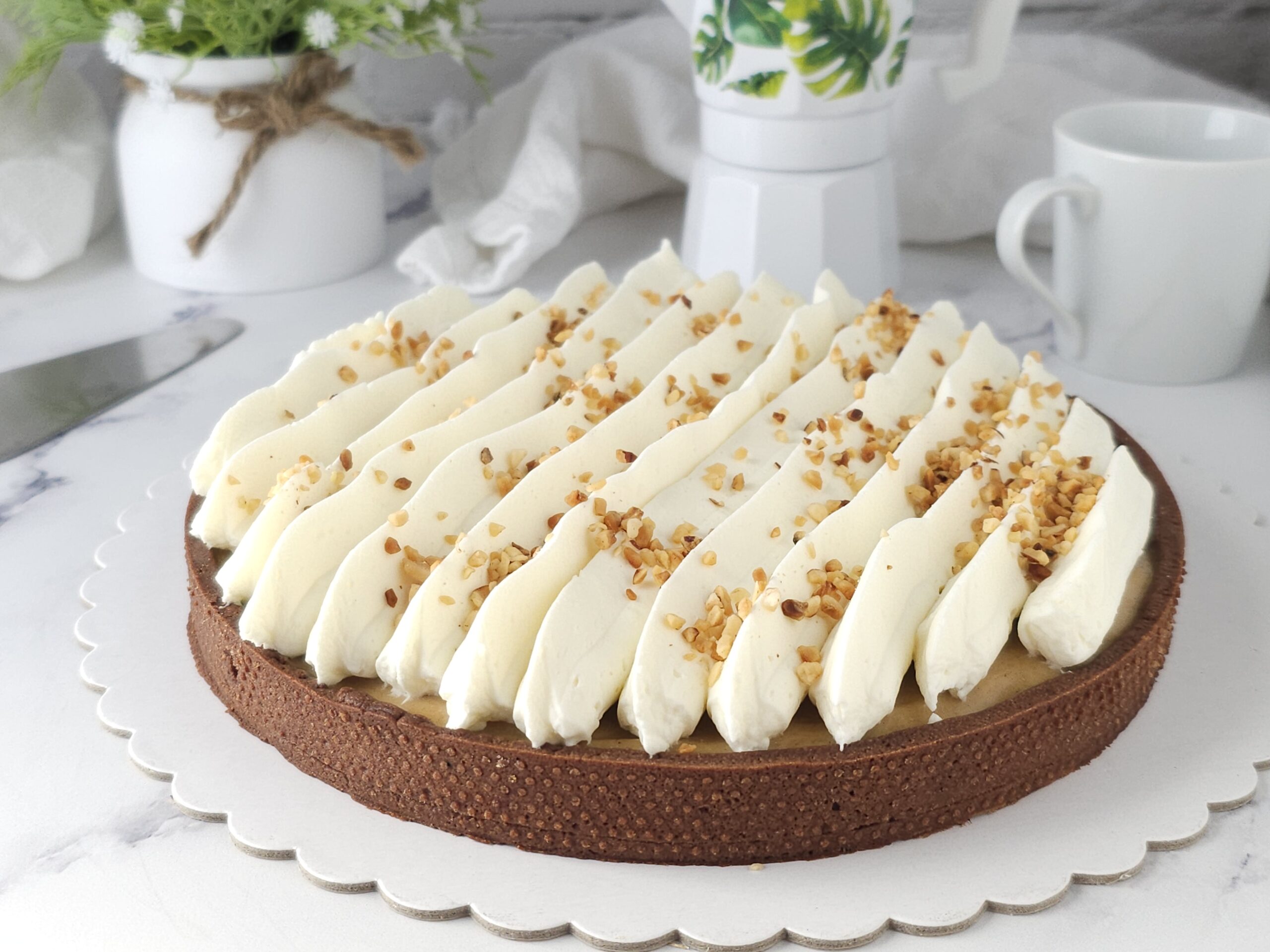 Taart met hazelnootmousse en opgemonteerde panna cotta