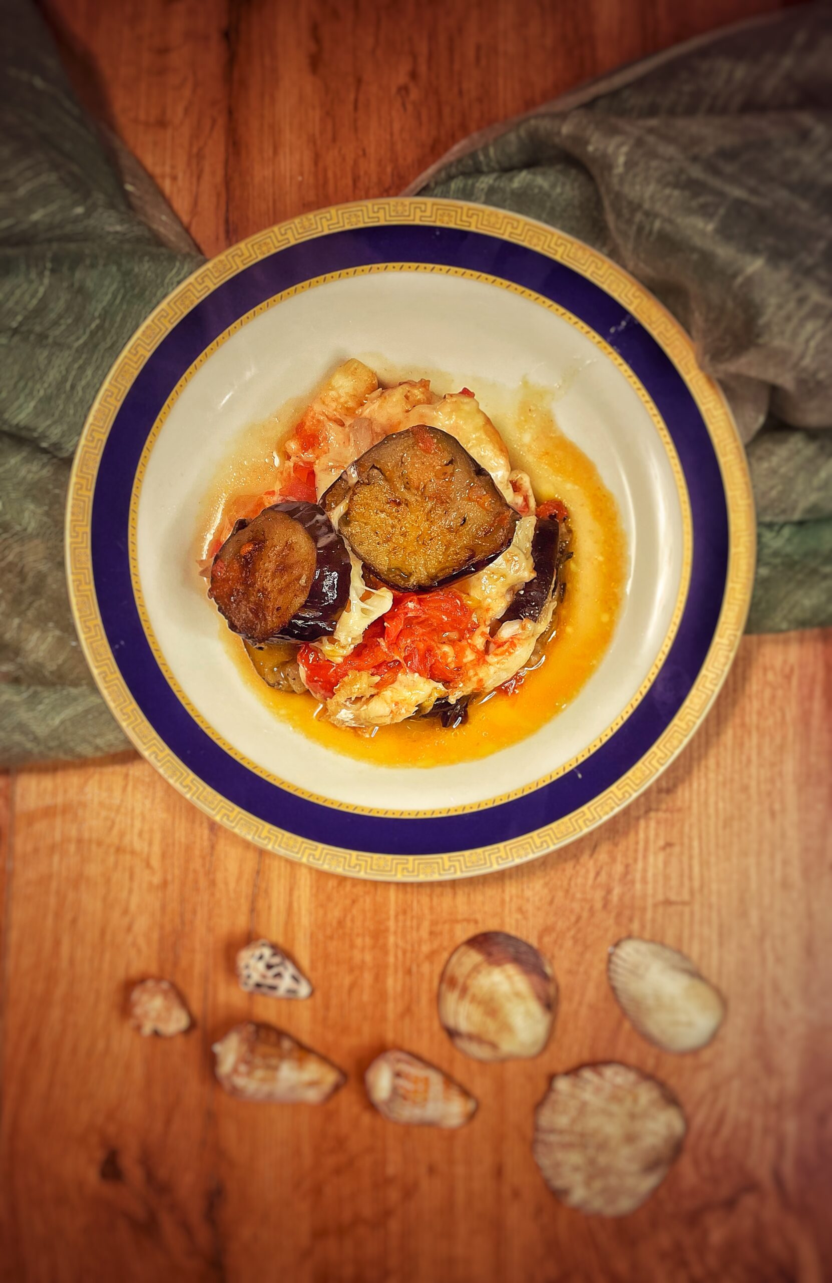 Parmigiana van kabeljauw en provola