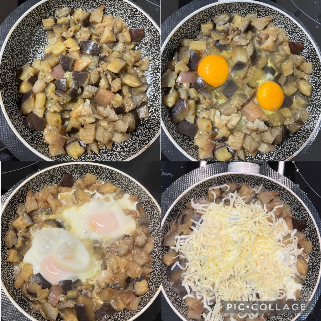Gesmolten eieren in de pan met aubergines