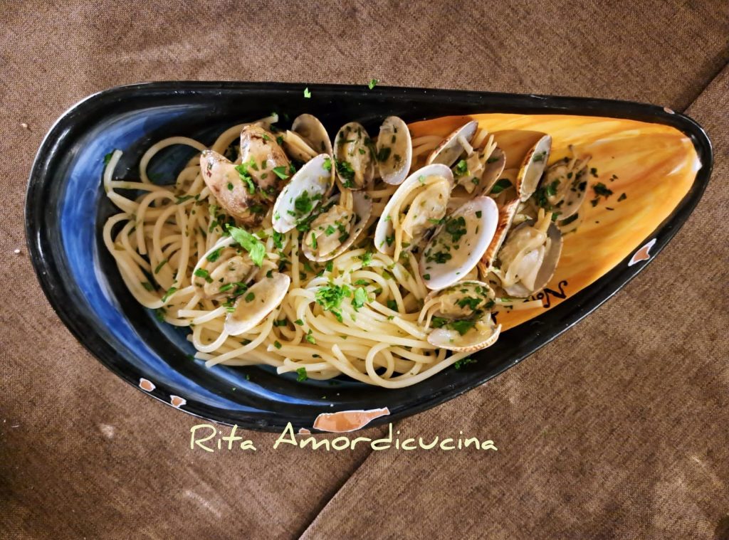 Spaghetti en venusschelpen risotto op Siciliaanse wijze