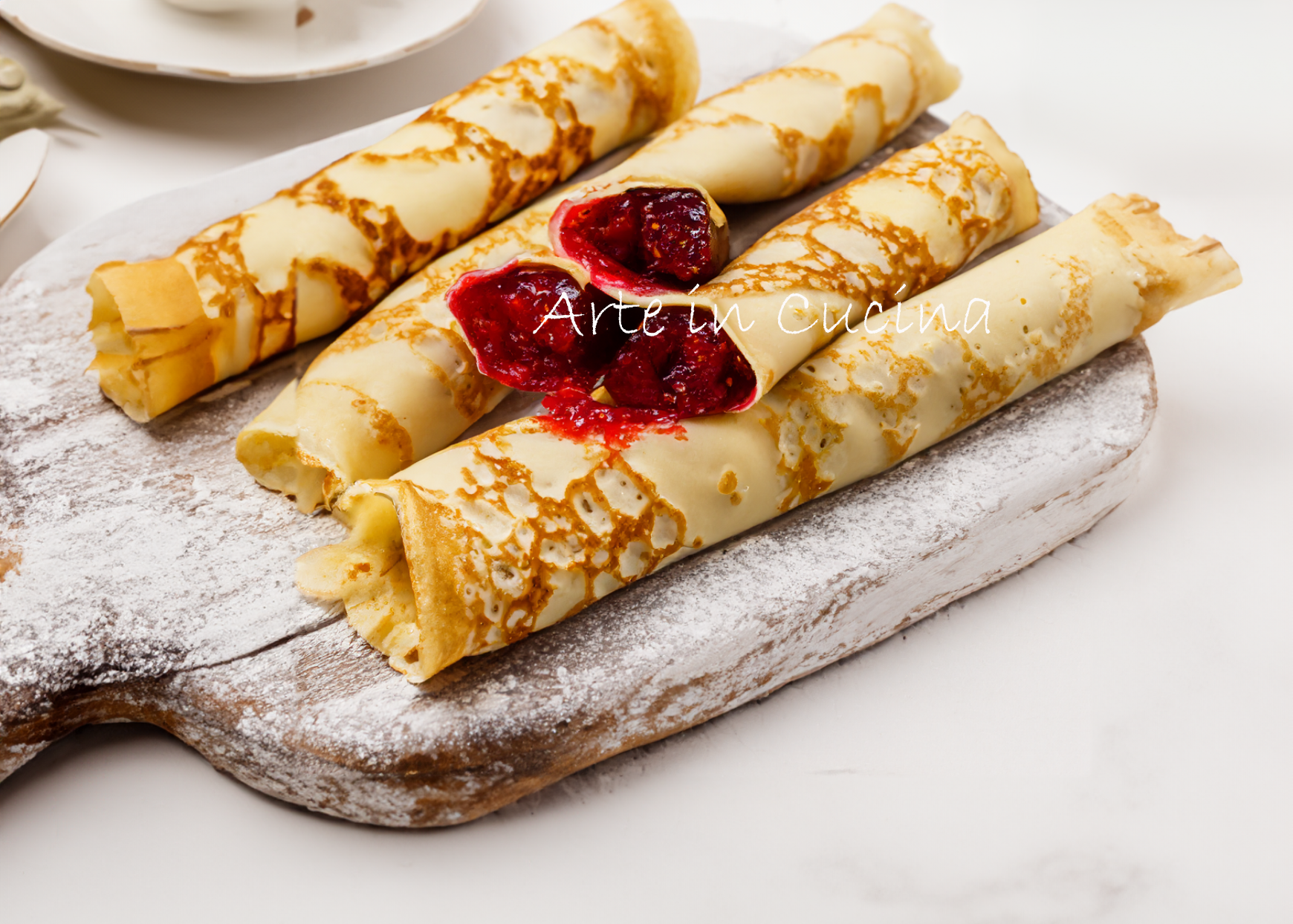 Opgerolde crêpes met jam