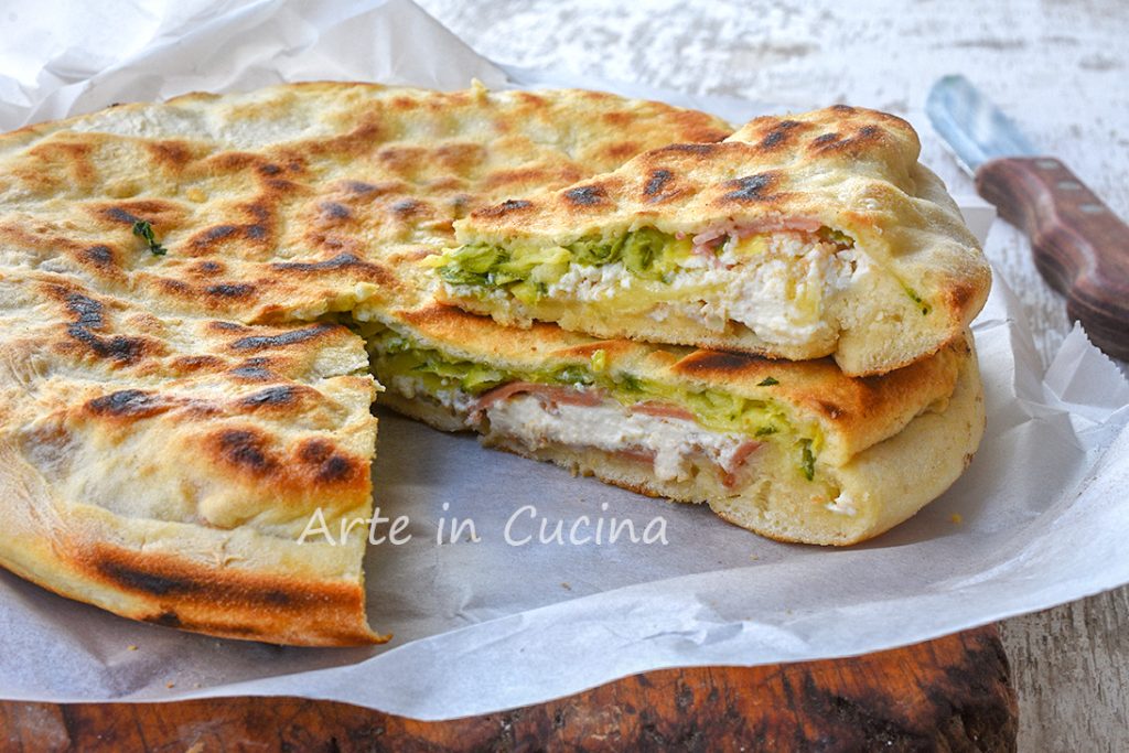 Platbrood met courgettes en ham in de pan