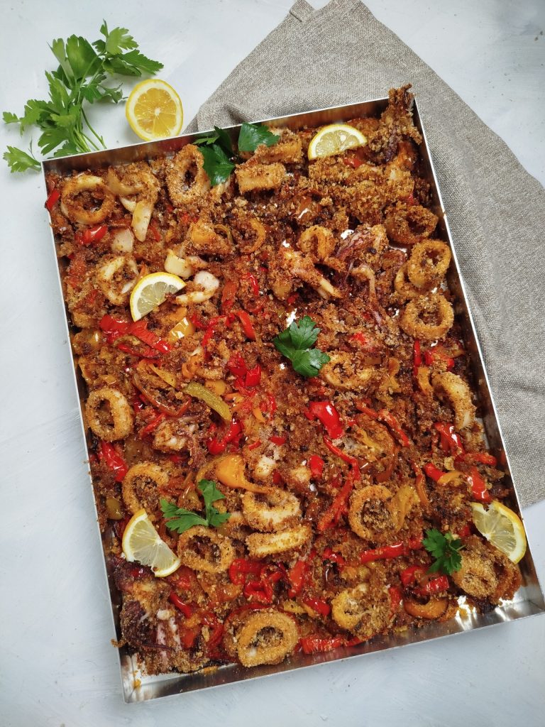 Inktvis en paprika's gegratineerd in de oven