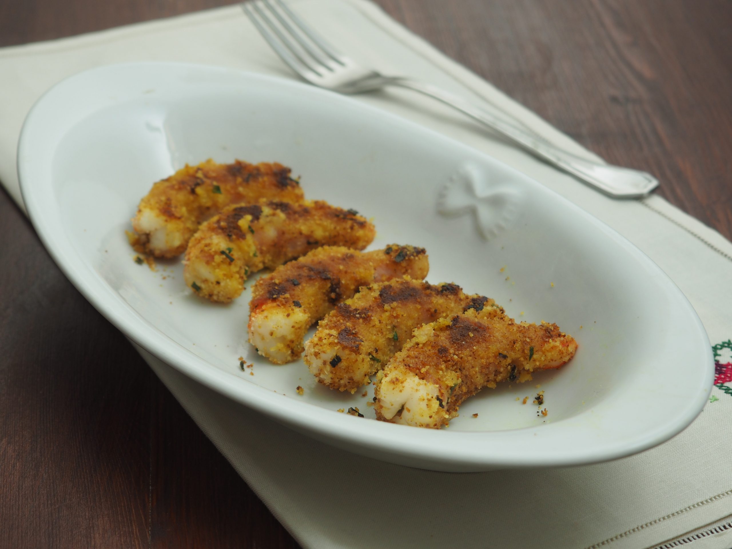 Garnalen gewikkeld in spek met paneermeel