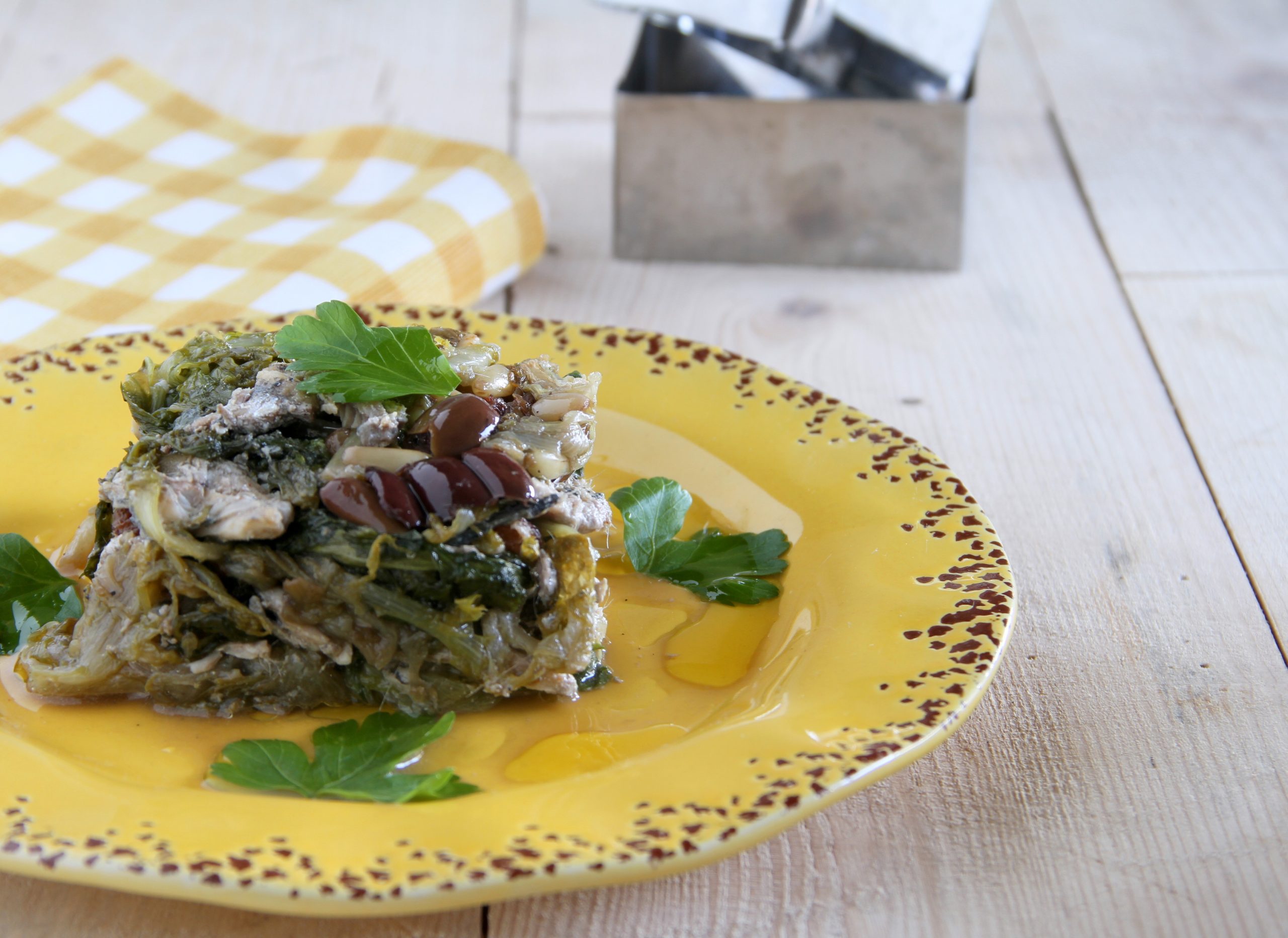 Gratin van ansjovis en krulandijvie