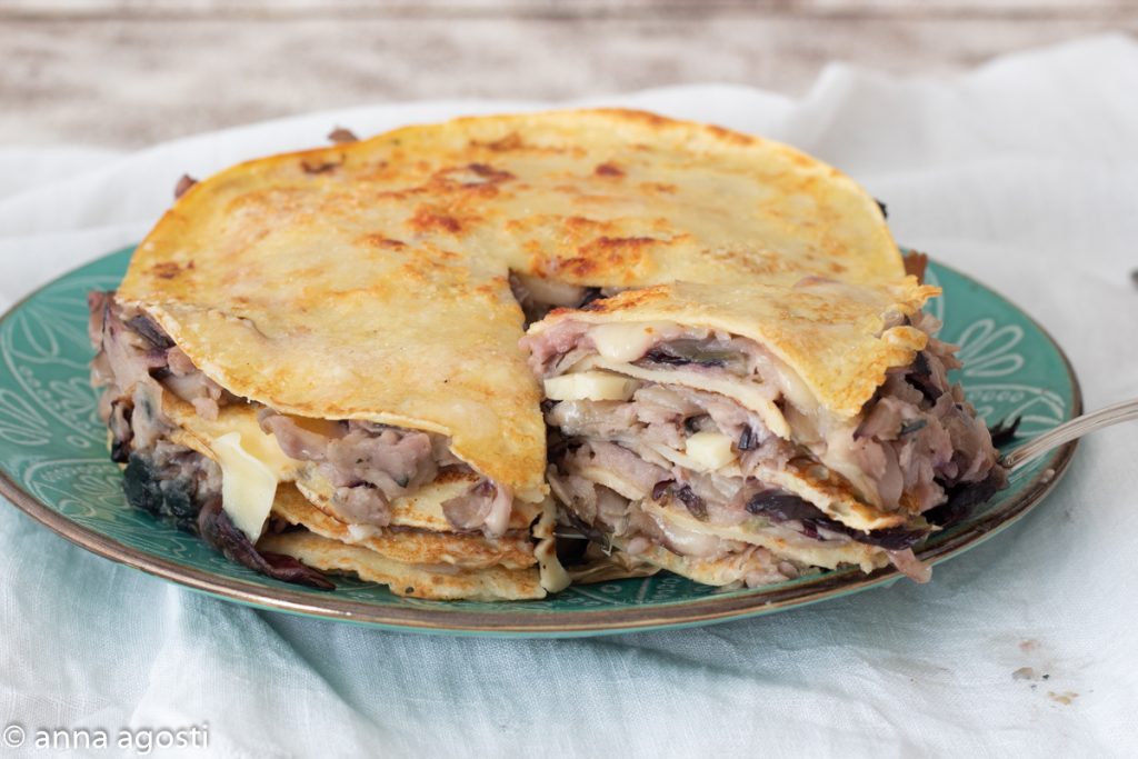 Pasticcio van crêpes met radicchio uit Treviso