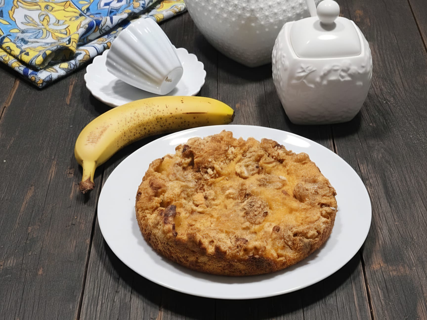 Zachte kruimeltaart met banaan en sinaasappel