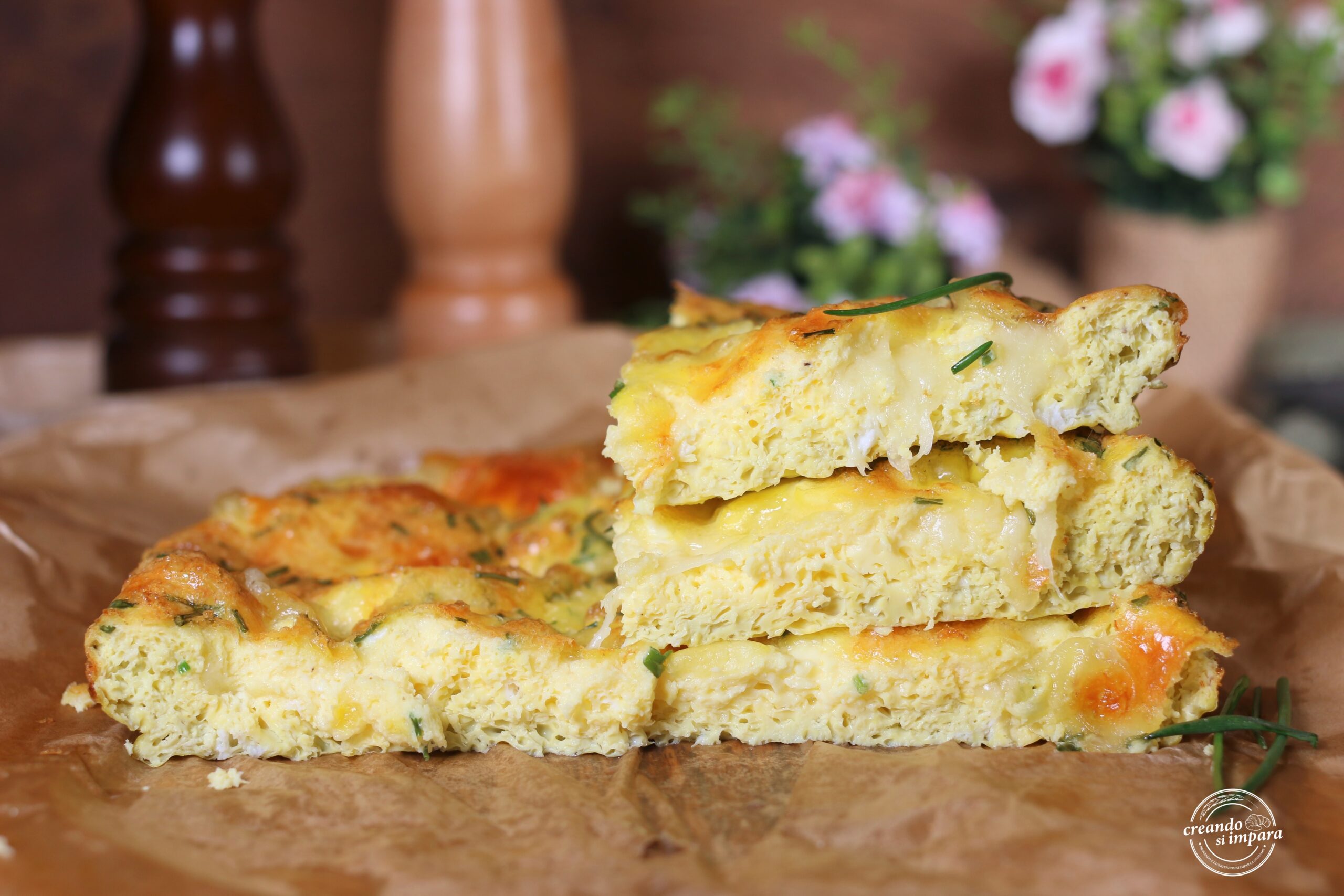 Ovenfrittata met mozzarella en bieslook: hoog en smeuïg