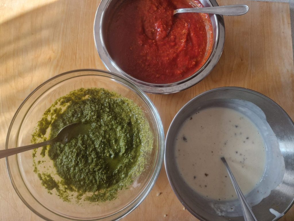 Lasagne in drie kleuren met pesto, bechamel en ragù