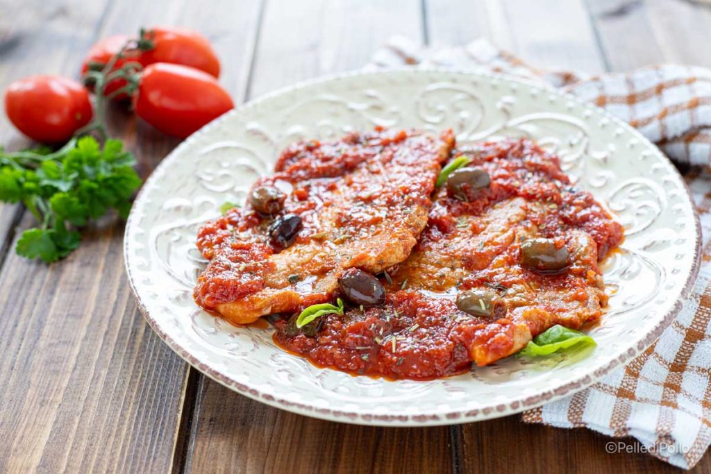 varkensnek in tomatensaus